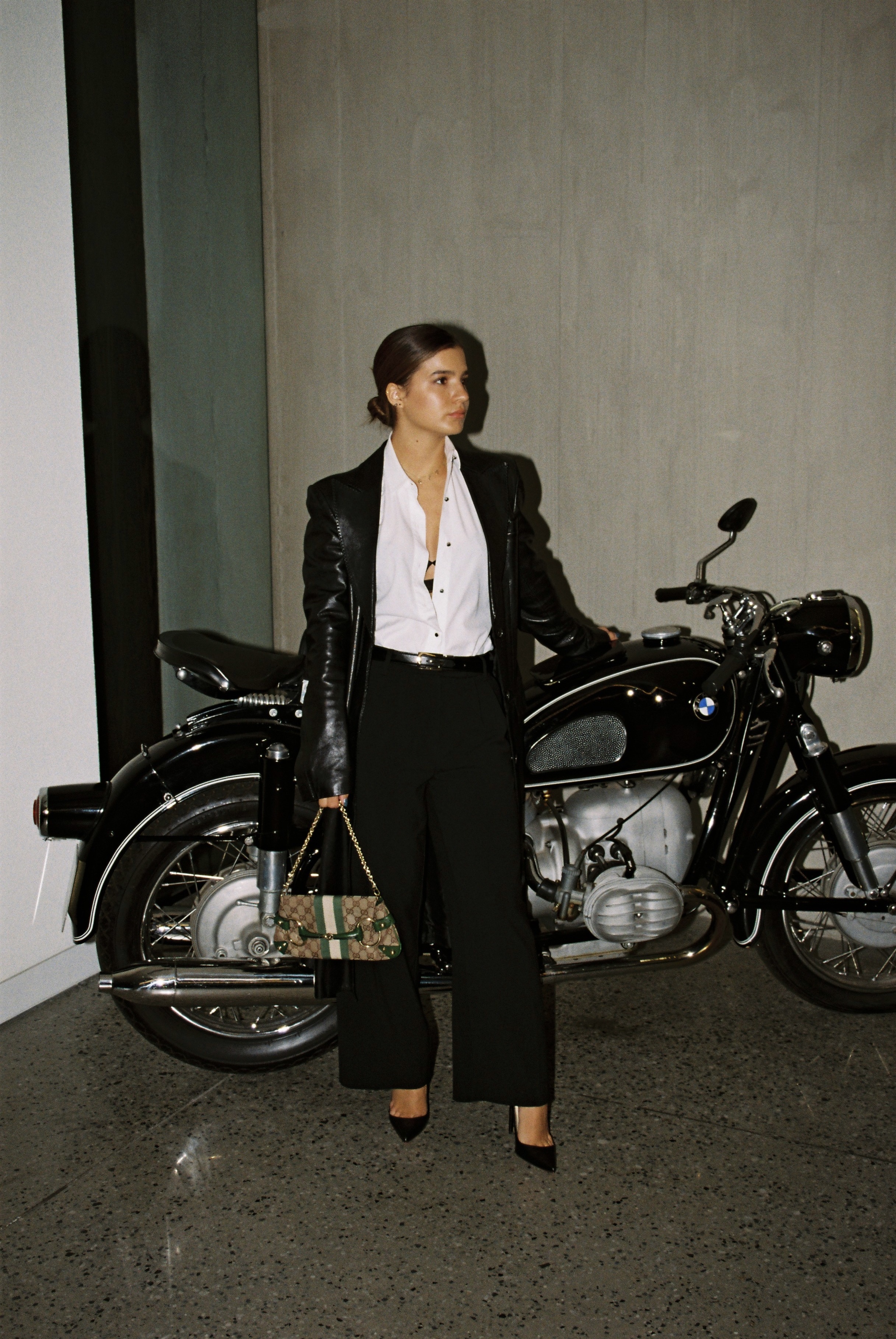 Gucci editorial — leather jacket with vintage BMW motorcycle